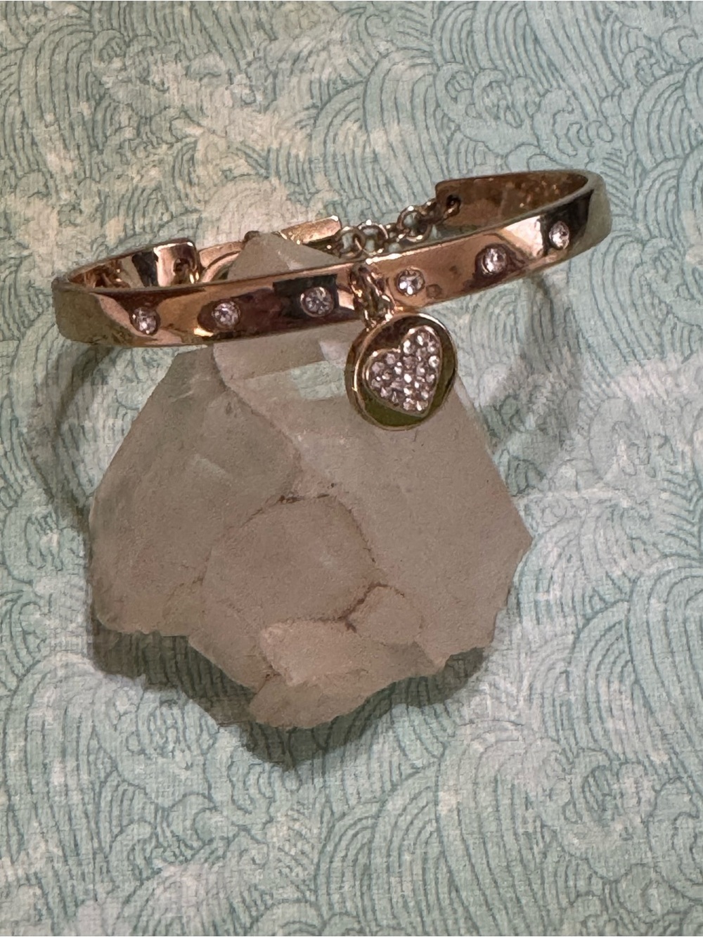 GOLD TONE CUFF BRACELET WITH HEART CHARM